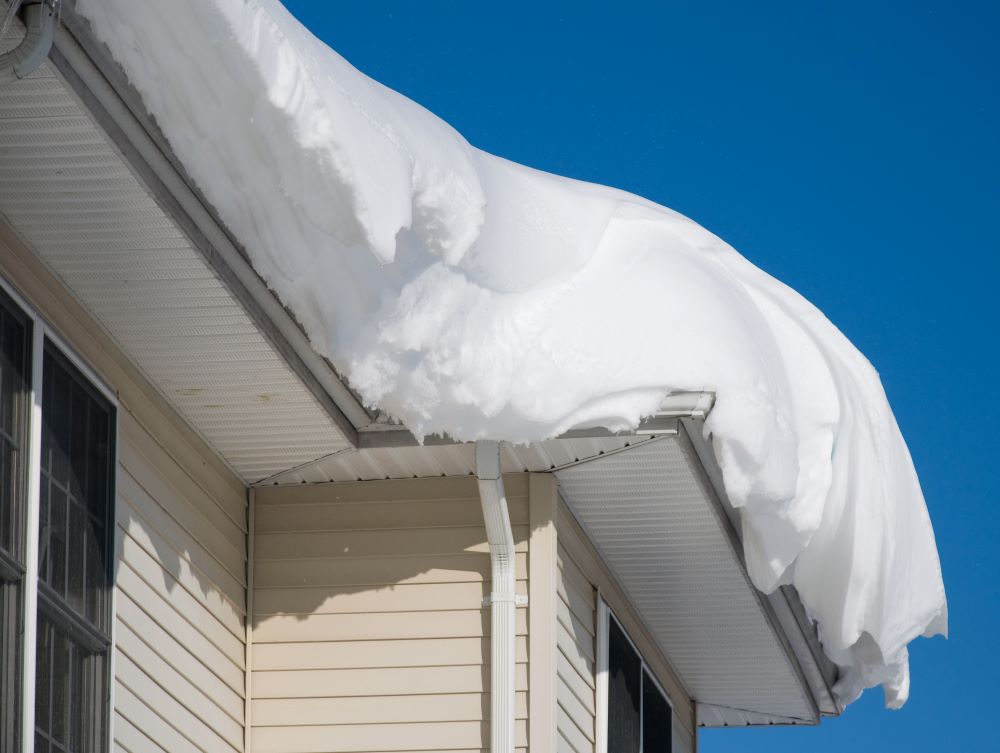 How do roof snow guards work?